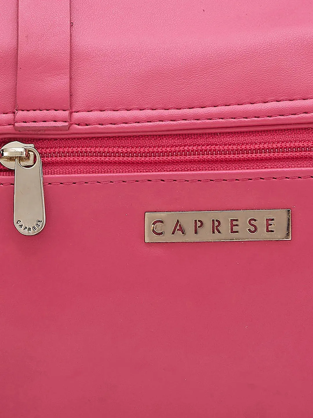 Caprese Emily In Paris Solid Small Sling Handbag Fuschia