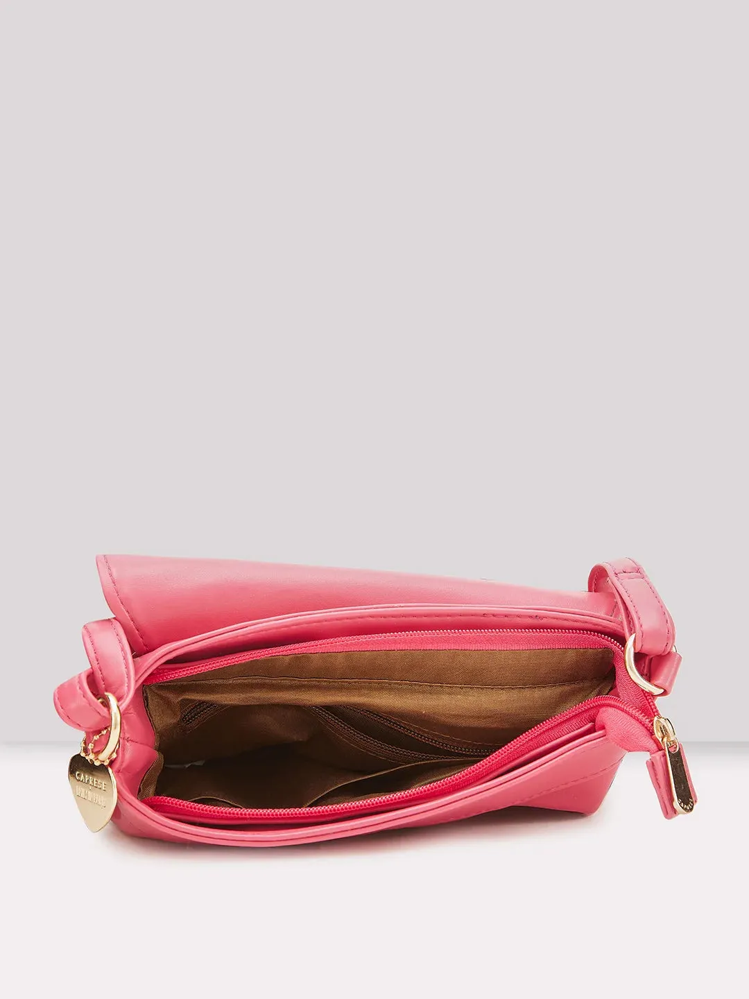 Caprese Emily In Paris Solid Small Sling Handbag Fuschia